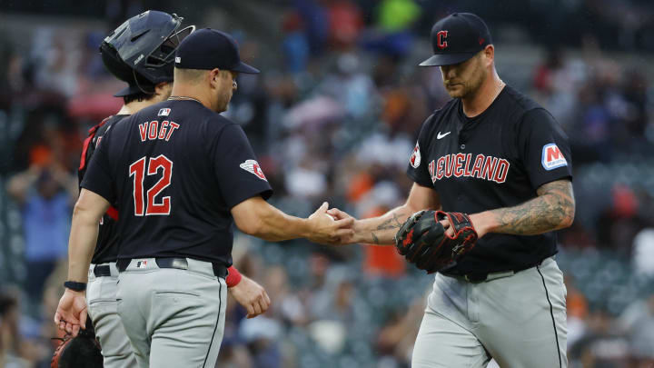 Jul 9, 2024; Detroit, Michigan, USA;  Cleveland Guardians manager Stephen Vogt (12) take the ball to relieve pitcher Ben Lively (39) in the sixth inning against the Detroit Tigers at Comerica Park. Mandatory Credit: Rick Osentoski-USA TODAY Sports