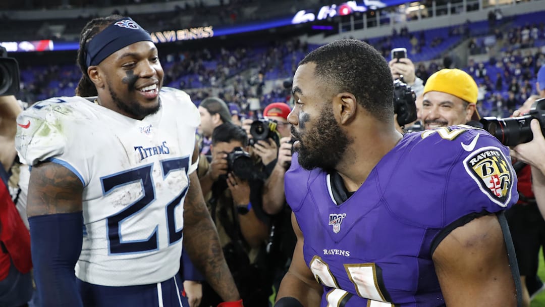 Jan 11, 2020; Baltimore, Maryland, USA; Tennessee Titans running back Derrick Henry (22) talks with Baltimore Ravens running back Mark Ingram (21) after their game in a AFC Divisional Round playoff football game at M&T Bank Stadium. 