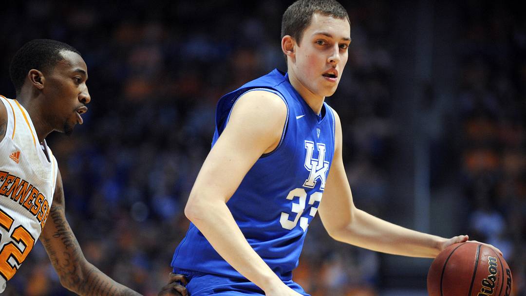 Mar 16, 2013; Knoxville, TN, USA; Kentucky Wildcats forward Kyle Wiltjer (33) brings the ball up court against Tennessee Volunteers guard Jordan McRae (52) during the first half at Thompson-Boling Arena. Mandatory Credit: Randy Sartin-Imagn Images