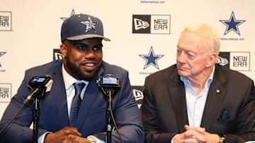 Apr 29, 2016; Irving, TX, USA; Dallas Cowboys number one draft pick Ezekiel Elliott answers questions with owner Jerry Jones  from reporters at Dallas Cowboys Headquarters Mandatory Credit: Matthew Emmons-Imagn Images