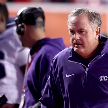 Oct 19, 2024; Salt Lake City, Utah, USA; TCU Horned Frogs head coach Sonny Dykes runs off the field at the end of the first half against the Utah Utes at Rice-Eccles Stadium. Mandatory Credit: Rob Gray-Imagn Images