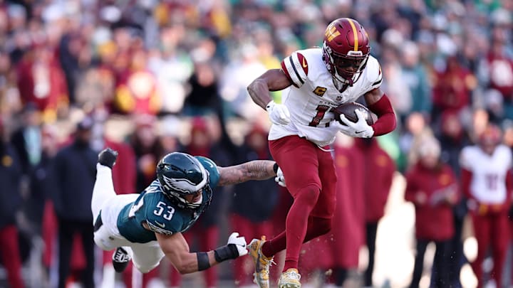 Jan 26, 2025; Philadelphia, PA, USA; Washington Commanders wide receiver Terry McLaurin (17) evades the tackle of Philadelphia Eagles linebacker Zack Baun (53) during the first half in the NFC Championship game at Lincoln Financial Field. Mandatory Credit: Bill Streicher-Imagn Images