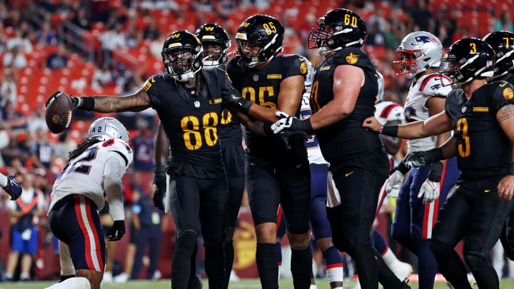 Aug 25, 2024; Landover, Maryland, USA; Washington Commanders wide receiver Martavis Bryant (88) celebrates after scoring a touchdown during the fourth quarter against the New England Patriots during a preseason game at Commanders Field. Mandatory Credit: Peter Casey-USA TODAY Sports