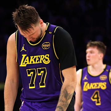 Feb 28, 2025; Los Angeles, California, USA; Los Angeles Lakers guard Luka Doncic (77) reacts after a play during the second quarter against the LA Clippers at Crypto.com Arena. Mandatory Credit: Jason Parkhurst-Imagn Images