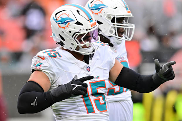 Miami Dolphins linebacker Jaelan Phillips (15) celebrates after a tackle during the first half against the Cleveland Browns.