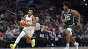 Mar 12, 2024; Washington, D.C., USA; Boston College Eagles guard Donald Hand Jr. (13) drives to the basket as Miami (Fl) Hurricanes forward Norchad Omier (15) chases in the second half at Capital One Arena. Mandatory Credit: Geoff Burke-Imagn Images