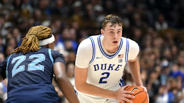 Nov 4, 2024; Durham, North Carolina, USA; Duke basketball guard Cooper Flagg (2) looks for an opening to pass during the second half against the Maine Black Bears at Cameron Indoor Stadium.