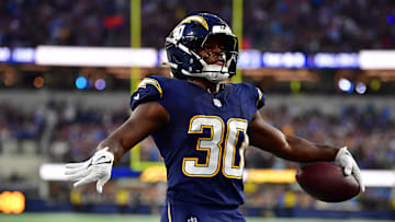 Oct 23, 2025; Inglewood, California, USA; Los Angeles Chargers running back Kimani Vidal (30) reacts after scoring a touchdown against the Minnesota Vikings during the first half at SoFi Stadium. 