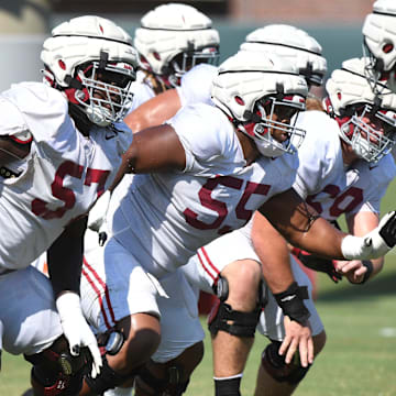 The Crimson Tide players and coaches continue working toward the season opener in practice Tuesday, Aug. 13, 2024. Alabama offensive lineman Elijah Pritchett (57), Alabama offensive lineman Roq Montgomery (55) and Alabama offensive lineman Joseph Ionata (69) move to block.