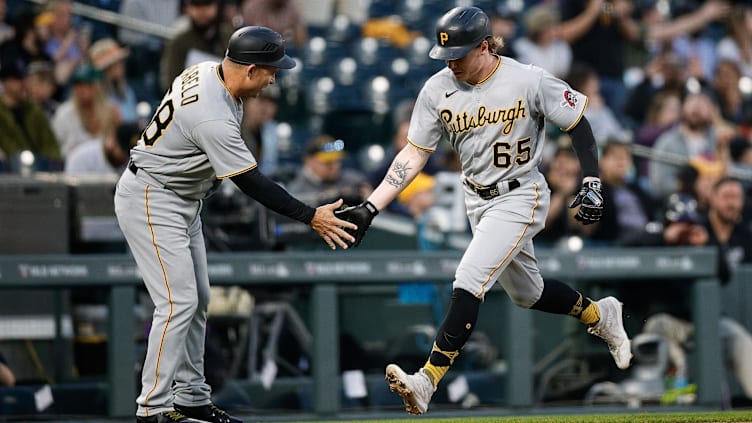 Apr 18, 2023; Denver, Colorado, USA; Pittsburgh Pirates center fielder Jack Suwinski (65) celebrates