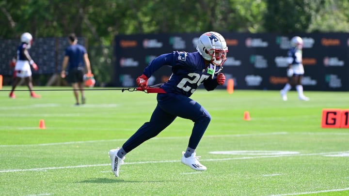 Jul 26, 2023; Foxborough, MA, USA; New England Patriots cornerback Marcus Jones (25) trains with a resistance rope during training camp  at Gillette Stadium. Mandatory Credit: Eric Canha-USA TODAY Sports