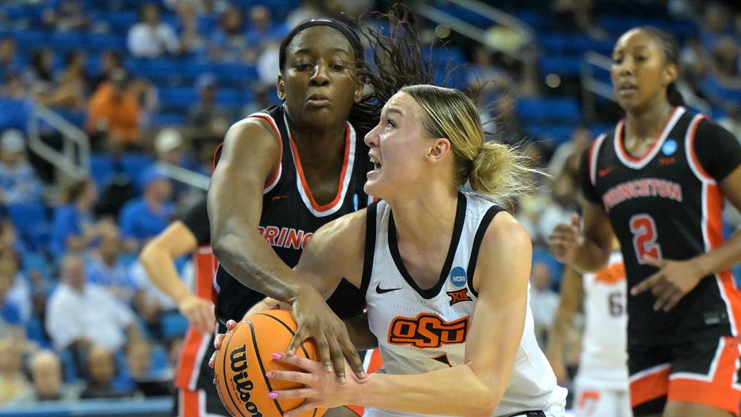 Mar 21, 2026; Los Angeles, CA, USA; Oklahoma State Cowboys guard Amari Whiting (1) is defended by Princeton Tigers guard Fadima Tall (5) in the second half at Pauley Pavilion. Mandatory Credit: Jayne Kamin-Oncea-Imagn Images