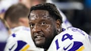 Jan 13, 2025; Glendale, AZ, USA; Minnesota Vikings tackle Cam Robinson (74) against the Los Angeles Rams during an NFC wild card game at State Farm Stadium. 