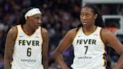 Aug 31, 2025; San Francisco, California, USA; Indiana Fever forwards Natasha Howard (6) and Aliyah Boston (7) stand on the court during the third quarter against the Golden State Valkyries at Chase Center. Mandatory Credit: Darren Yamashita-Imagn Images