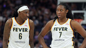 Aug 31, 2025; San Francisco, California, USA; Indiana Fever forwards Natasha Howard (6) and Aliyah Boston (7) stand on the court during the third quarter against the Golden State Valkyries at Chase Center. Mandatory Credit: Darren Yamashita-Imagn Images