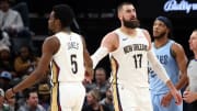 Feb 12, 2024; Memphis, Tennessee, USA; New Orleans Pelicans center Jonas Valanciunas (17) reacts with forward Herbert Jones (5) during the first half against the Memphis Grizzlies at FedExForum. Mandatory Credit: Petre Thomas-USA TODAY Sports