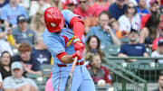 Jun 14, 2025; Milwaukee, Wisconsin, USA;  St. Louis Cardinals third baseman Nolan Arenado (28) hits a single in the fourth inning against the Milwaukee Brewers at American Family Field. Mandatory Credit: Benny Sieu-Imagn Images