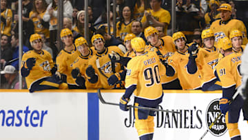 Apr 14, 2025; Nashville, Tennessee, USA;  Nashville Predators center Ryan O'Reilly (90) celebrates his goal with his teammates against the Utah Hockey Club during the first period at Bridgestone Arena. Mandatory Credit: Steve Roberts-Imagn Images