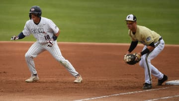 The Wofford Terriers took on the  Samford Bulldogs for the Southern Conference Baseball Championship at Greenville's  Fluor Field on May 27, 2023.The Wofford Terriers took on the  Samford Bulldogs for the Southern Conference Baseball Championship at Greenville's  Fluor Field on May 27, 2023. Samford's Lucas Steele (18) on base as Wofford's Ryan Galena (14) guards base.