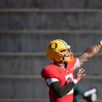 Oregon quarterback Dillon Gabriel throws out a pass during practice with the Oregon Ducks Wednesday, Aug. 28, 2024 at the Hatfield-Dowlin Complex in Eugene, Ore.