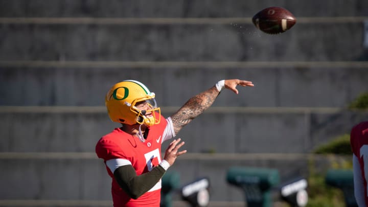 Oregon quarterback Dillon Gabriel throws out a pass during practice with the Oregon Ducks Wednesday, Aug. 28, 2024 at the Hatfield-Dowlin Complex in Eugene, Ore.