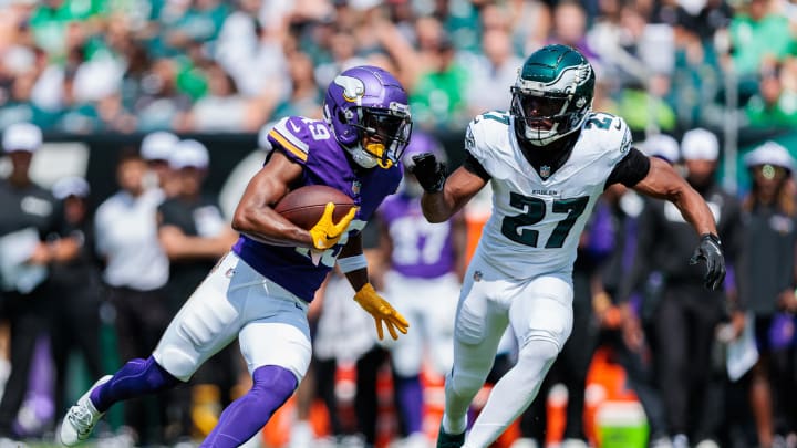 Aug 24, 2024; Philadelphia, Pennsylvania, USA; Minnesota Vikings wide receiver Justin Hall (49) runs the ball against Philadelphia Eagles cornerback Zech McPhearson (27) during the second quarter at Lincoln Financial Field. Mandatory Credit: Caean Couto-USA TODAY Sports