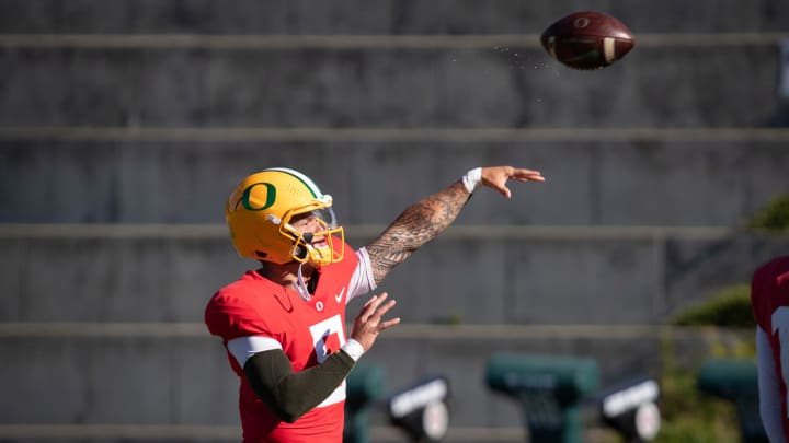 Oregon quarterback Dillon Gabriel throws out a pass during practice with the Oregon Ducks Wednesday, Aug. 28, 2024 at the Hatfield-Dowlin Complex in Eugene, Ore.