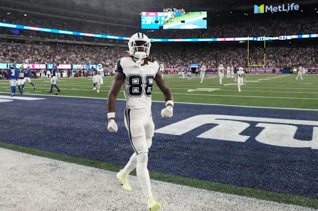 Dallas Cowboys wide receiver CeeDee Lamb celebrates after a touchdown against the Giants in the first half at MetLife Stadium