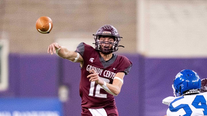 Grundy Center's Judd Jirovsky (12) throws to Jacob Hoy (16) on Thursday, Nov. 21, 2024, at the UNI-Dome in Cedar Falls, IA.