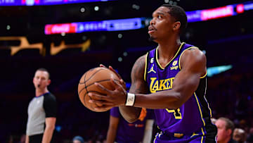 Apr 7, 2023; Los Angeles, California, USA; Los Angeles Lakers guard Lonnie Walker IV (4) shoots against the Phoenix Suns during the first half at Crypto.com Arena. 