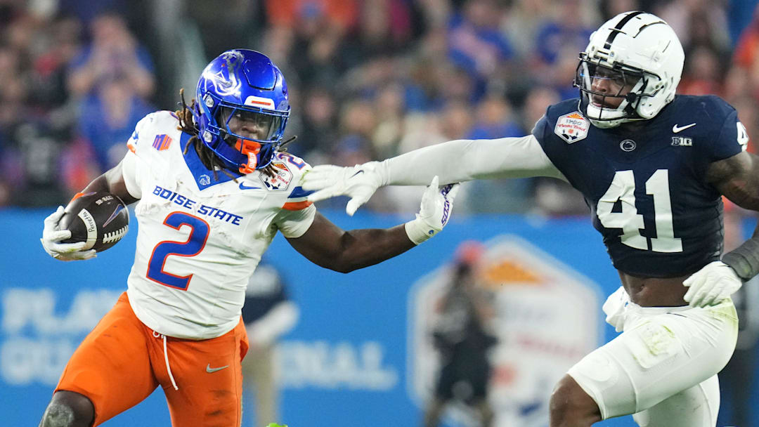 Boise State Broncos running back Ashton Jeanty (2) runs past Penn State Nittany Lions linebacker Kobe King (41)
