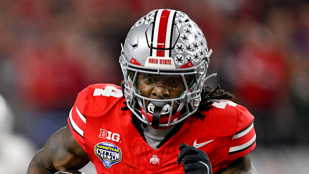 Dec 31, 2025; Arlington, TX, USA; Ohio State Buckeyes wide receiver Jeremiah Smith (4) runs for a touchdown during the 2025 Cotton Bowl and quarterfinal game of the College Football Playoff at AT&T Stadium. Mandatory Credit: Jerome Miron-Imagn Images