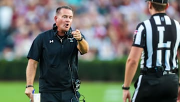 Columbia, South Carolina, USA; Coastal Carolina Chanticleers head coach Tim Beck disputes a call against the South Carolina Gamecocks in the first quarter at Williams-Brice Stadium. 