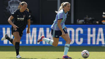 Aug 18, 2024; Washington, DC, USA; Arsenal FC forward Alessia Russo (23) dribbles the ball as Washington Spirit defender Tara McKeown (9) chases in the second half at Audi Field. Mandatory Credit: Geoff Burke-USA TODAY Sports