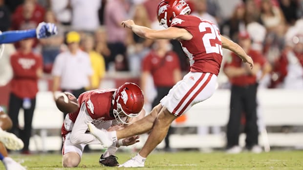Arkansas Razorbacks kicker Cam Little (29) kicks a field goal as time expires in the first half against the BYU Cougars at Do