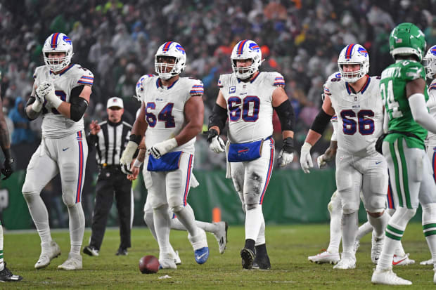 buffalo bills tackle Spencer Brown (79), guard O'Cyrus Torrence (64), center Mitch Morse (60), and guard Connor McGovern