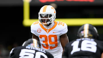 Nov 30, 2024; Nashville, Tennessee, USA;  Tennessee Volunteers linebacker Jalen Smith (39) takes a peak into the backfield against the Vanderbilt Commodores during the first half at FirstBank Stadium. Mandatory Credit: Steve Roberts-Imagn Images