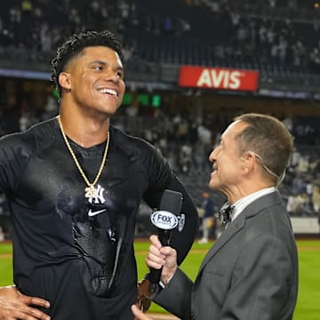 Fox broadcaster interviews New York Yankees right fielder Juan Soto (22) after getting the game winning hit against the Boston Red Sox at Yankee Stadium on Sept 12.