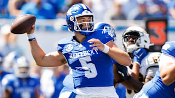 Aug 30, 2025; Lexington, Kentucky, USA; Kentucky Wildcats quarterback Zach Calzada (5) throws a pass during the first quarter against the Toledo Rockets at Kroger Field. Mandatory Credit: Jordan Prather-Imagn Images