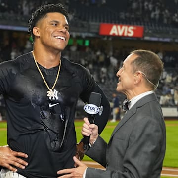 Sep 12, 2024; Bronx, New York, USA; Fox broadcaster interviews New York Yankees right fielder Juan Soto (22) after getting the game winning hit against the Boston Red Sox at Yankee Stadium. Mandatory Credit: Gregory Fisher-Imagn Images