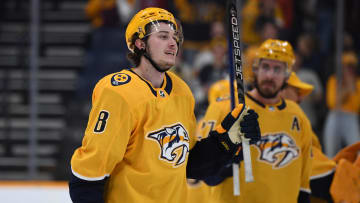 Apr 4, 2023; Nashville, Tennessee, USA; Nashville Predators center Cody Glass (8) celebrates after scoring the game-winning goal in overtime against the Vegas Golden Knights at Bridgestone Arena. Mandatory Credit: Christopher Hanewinckel-USA TODAY Sports