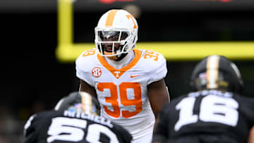 Nov 30, 2024; Nashville, Tennessee, USA;  Tennessee Volunteers linebacker Jalen Smith (39) takes a peak into the backfield against the Vanderbilt Commodores during the first half at FirstBank Stadium. Mandatory Credit: Steve Roberts-Imagn Images