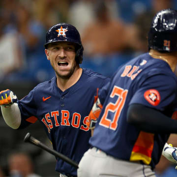 Aug 12, 2024; St. Petersburg, Florida, USA; Houston Astros third baseman Alex Bregman (2) celebrates with catcher Yainer Diaz (21) after hitting a home run against the Tampa Bay Rays in the first inning  at Tropicana Field. 