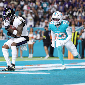 Baltimore Ravens wide receiver Rashod Bateman (7) catches a pass for a touchdown during the third quarter against the Miami Dolphins at Hard Rock Stadium.