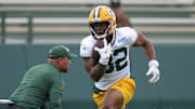 Running back MarShawn Lloyd (32) is shown during organized team activities last year.