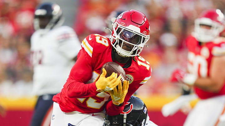 Aug 22, 2024; Kansas City, Missouri, USA; Kansas City Chiefs wide receiver Kadarius Toney (19) is tackled by Chicago Bears linebacker Amen Ogbongbemiga (45) at GEHA Field at Arrowhead Stadium. Mandatory Credit: Jay Biggerstaff-Imagn Images