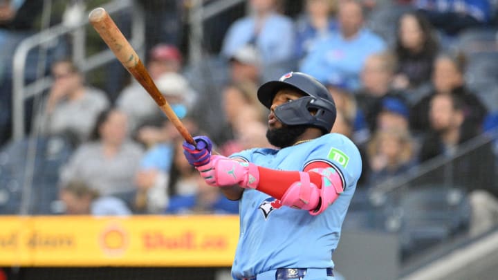 Toronto Blue Jays designated hitter Vladimir Guerrero Jr. (27) hits a solo home run against the Cincinnati Reds in the first inning at Rogers Centre on Aug 19.