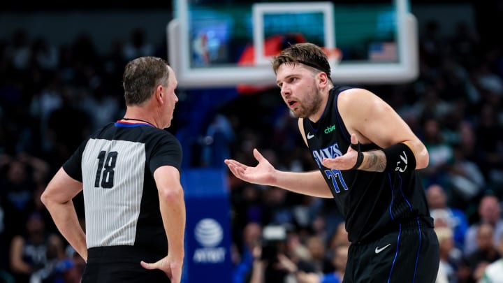 Dec 6, 2023; Dallas, Texas, USA; Dallas Mavericks guard Luka Doncic (77) argues with referee Matt Boland (18) after getting a technical foul during the second half against the Utah Jazz at American Airlines Center. Mandatory Credit: Kevin Jairaj-USA TODAY Sports