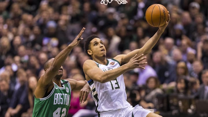 Apr 26, 2018; Milwaukee, WI, USA; Milwaukee Bucks guard Malcolm Brogdon (13) shoots in front of Boston Celtics forward Al Horford (42) during the first quarter in game six of the first round of the 2018 NBA Playoffs at BMO Harris Bradley Center. Mandatory Credit: Jeff Hanisch-Imagn Images Apr 26, 2018; Milwaukee, WI, USA; Milwaukee Bucks guard Malcolm Brogdon (13) shoots in front of Boston Celtics forward Al Horford (42) during the first quarter in game six of the first round of the 2018 NBA Playoffs at BMO Harris Bradley Center. Mandatory Credit: Jeff Hanisch-Imagn Images
