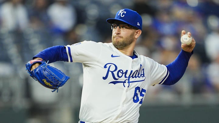 Noah Cameron pitches against the Reds.